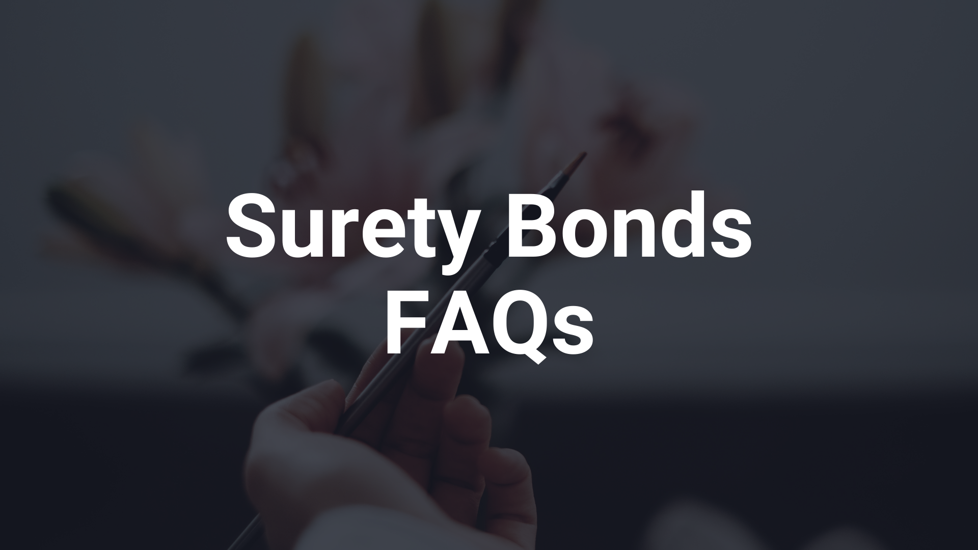 surety bond - What is a surety bond - hand holding a piece of paper